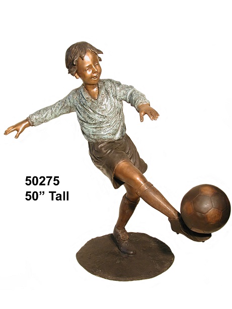 Bronze Boy Kicking a Soccer Goal